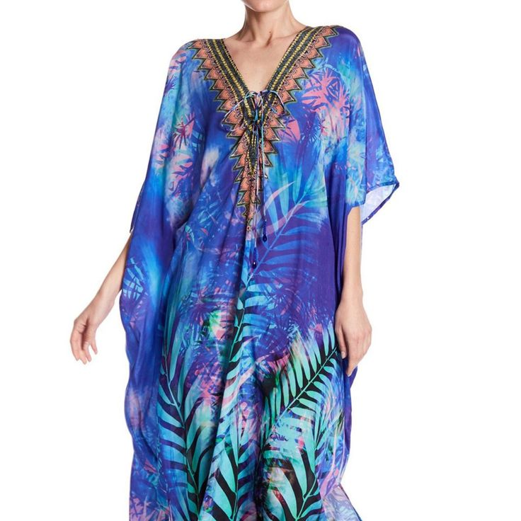 Brand - Shahida Parides One Size Fits ( 2-14 ) Usa Size Kaftan Dress Multi Wear 3 Ways To Different Style Shahida Long Kaftan Dress Convertible Kaftan One Of 3 Ways For Style You'll Love! Versatility Ensures You'll Never Be Bored Of This V-Neck Lace Up Kaftan! - V-Neck, Halter, Off-The-Shoulder Neckline Handmade Kaftan - Approx. 58”-60" Long Kaftan - Viscose Silk Crepe Kaftan Dress Women's Caftan Dress_long_caftan_for_women Blue Printed Kaftan With Kimono Sleeves, Blue Kaftan With Kimono Sleeves For Vacation, Blue Silk Kimono For Vacation, Blue Kaftan With Kimono Sleeves For Festivals, Elegant Blue Kimono For Vacation, Blue Tropical Kaftan For Vacation, Tropical Blue Kaftan For Vacation, Blue Tunic Kimono For Beachwear, Blue Floral Print Kaftan For Beach