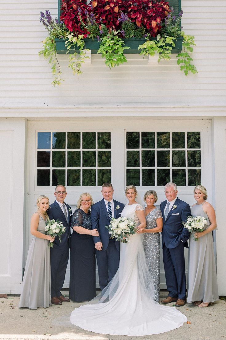 a bride and groom with their bridal party