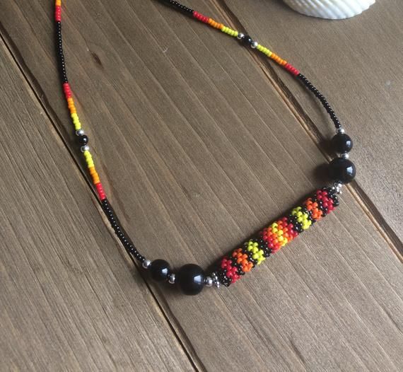 Spiritual Festival Choker Necklace, Spiritual Choker Necklaces For Festivals, Unique Jewelry With Tiny Round Beads, Unique Jewelry With Tiny Beads For Gifts, Southwestern Black Beaded Necklaces For Festivals, Handmade Southwestern Black Beaded Necklace, Southwestern Black Beaded Necklace For Festivals, Adjustable Southwestern Beaded Necklace With Black Beads, Southwestern Adjustable Jewelry With Colorful Beads