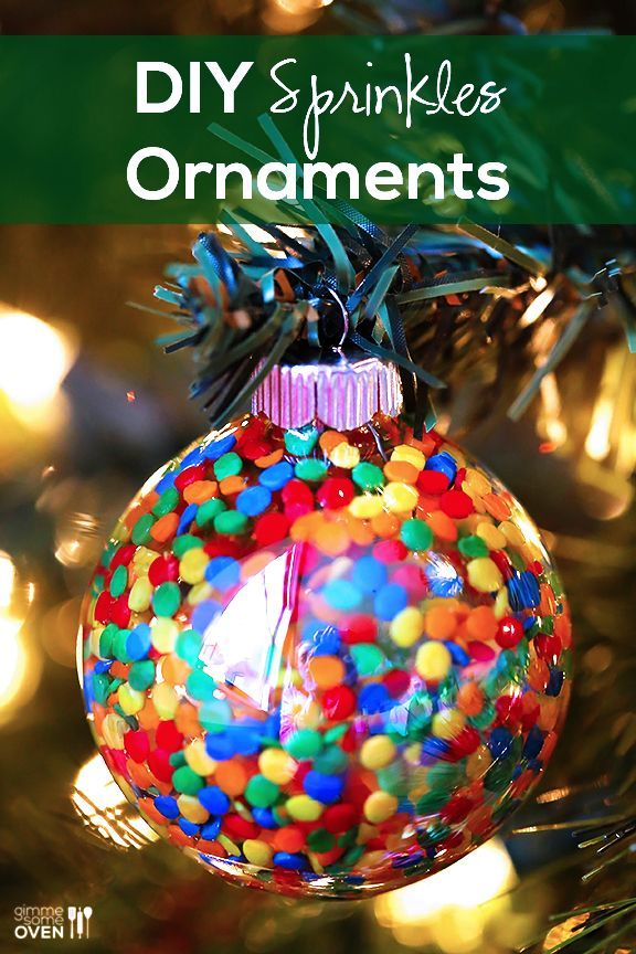 an ornament hanging from a christmas tree with the words diy sprinkles ornaments on it