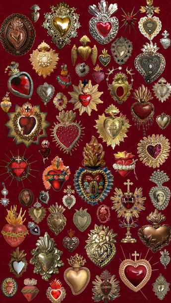 many different types of heart shaped brooches on a red background