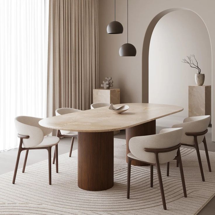 a dining room table with chairs and an arch in the wall behind it, along with a rug on the floor