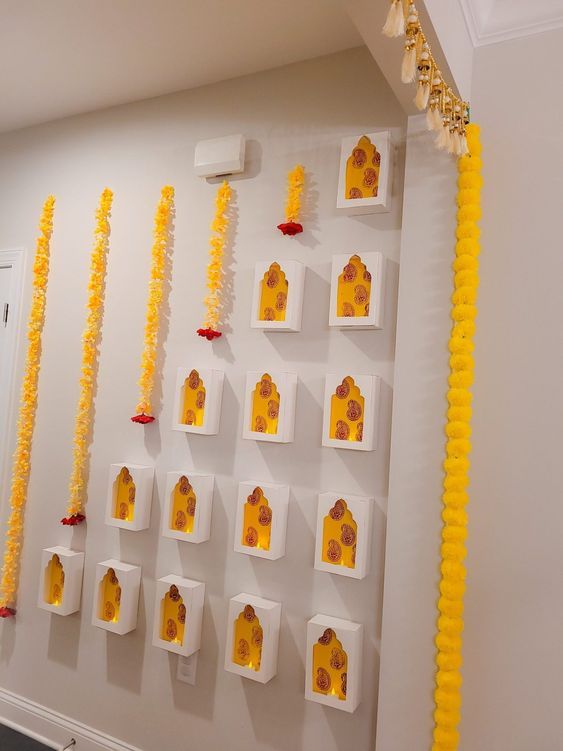 there are many yellow decorations on the wall