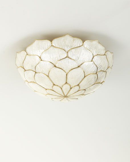 a white ceiling light hanging from the ceiling