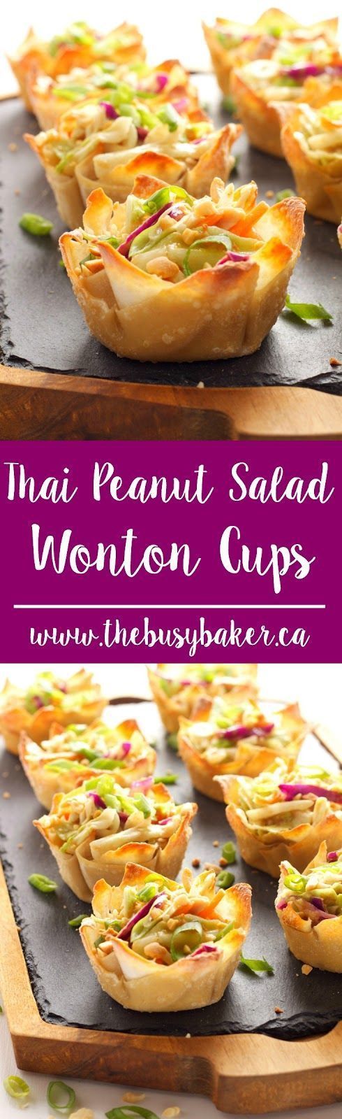 mini peanut salad wonton cups on a tray with text overlay that reads,'thai peanut salad wonton cups '