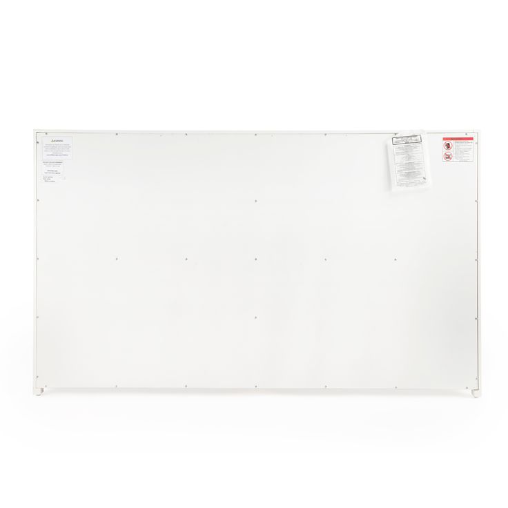 an empty white board with some stickers on it's back and bottom corner