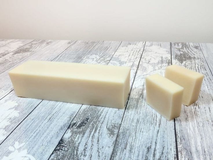 a bar of soap sitting on top of a wooden table