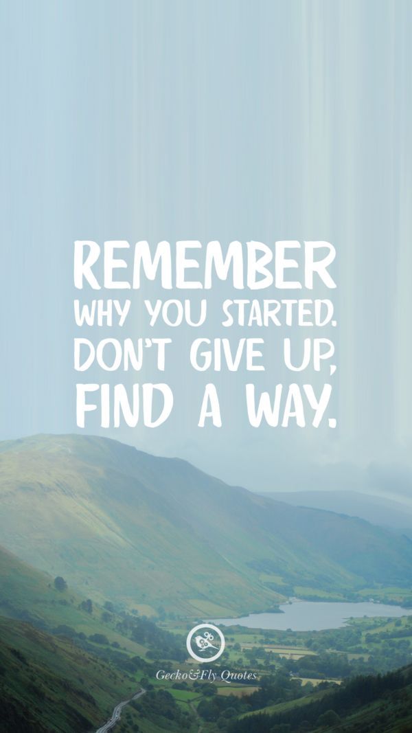 a quote on the side of a mountain saying, remember why you started don't give up find a way