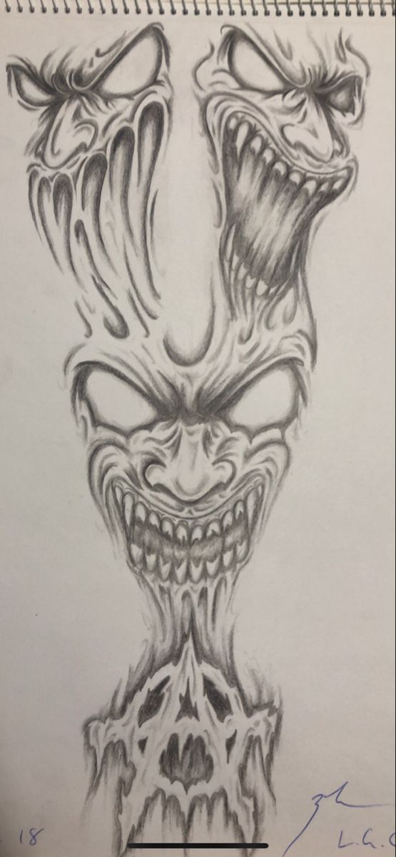 a drawing of an evil face with fangs on it's head and teeth in the middle