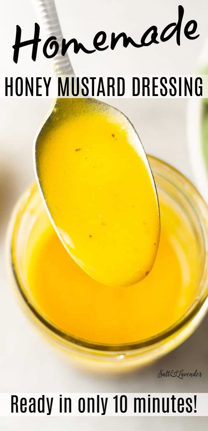 a spoon full of honey mustard with the words homemade honey mustard dressing on it and below