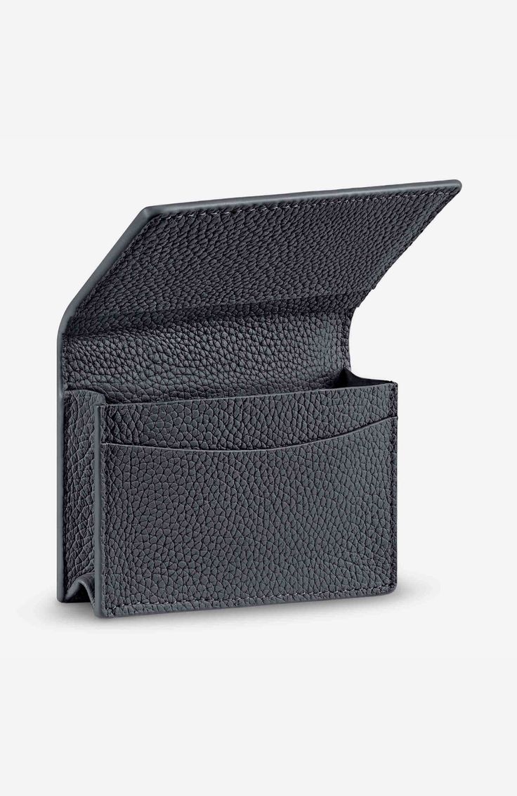 Designed to carry your priority payment cards alongside your printed business cards, so everything’s always on hand. Keep track of important clients and connections with an expandable body compartment for up to 18 business cards. The Card Case also keeps your most-used payment card always ready with a priority card slot at the rear, so you can pay as smoothly as you sound on paper. Comfortably fits 12-18 credit and business cards. Crafted entirely from full-grain DriTan leather Expandable intern Business Trifold Wallet With Card Slots, Formal Rectangular Card Holder With Interior Slots, Business Trifold Wallet With Interior Card Slots, Compact Business Bag With Card Slots, Business Bifold Card Holder With Cell Phone Pocket, Business Cases With Card Slots And Rectangular Shape, Formal Card Holder With Interior Slots, Modern Rectangular Cases With Card Slots, Business Wallets With Card Slots