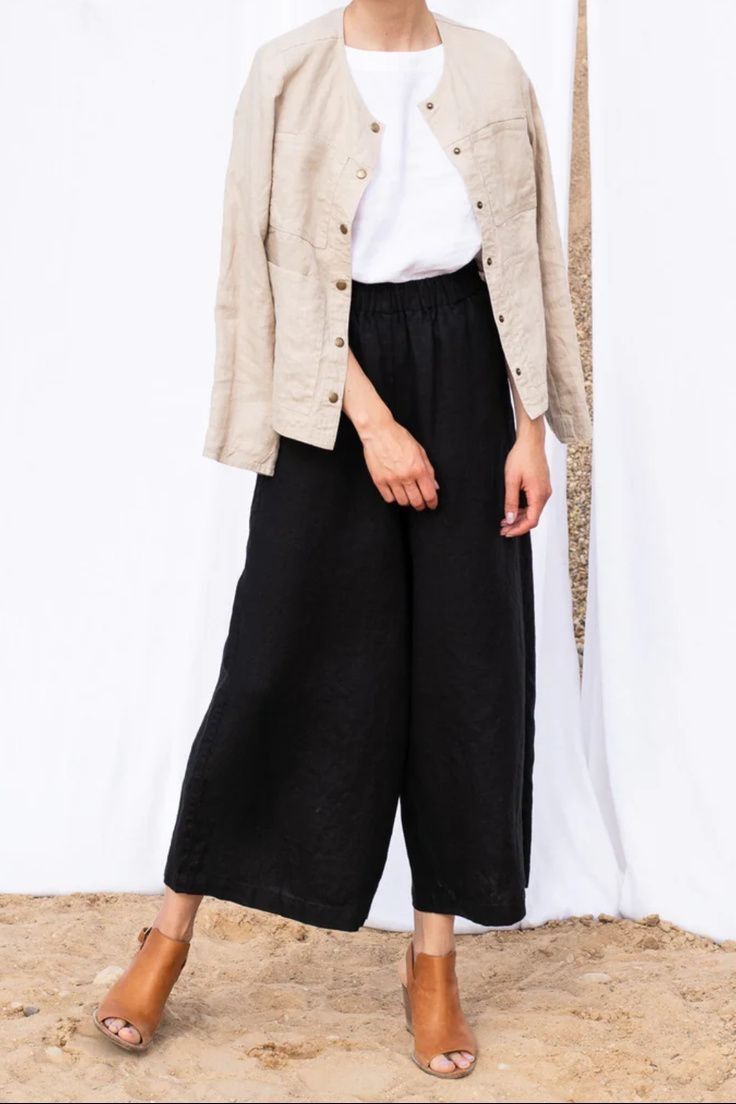 Discover the magic of the Maxi WELS wide leg linen pants in Black, the perfect addition to your fall wardrobe. Comfortable, stylish, and versatile, these sustainable fashion-forward wide leg pants can be dressed up or down for any occasion. Don't miss your chance to upgrade your closet – shop today and don't forget to pin for later! Autumn Looks, Capsule Wardrobe Women, Black Linen Pants, Minimalist Fashion Women, Linen Bottoms, Linen Fashion, Linen Jackets, Fashion Marketing, Wide Leg Linen Pants