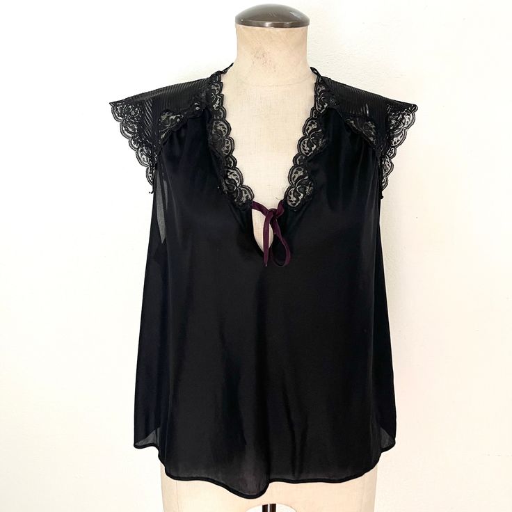 Vintage 80s designer lingerie top. Black with lace shoulder detail and tie in center.  Size - No size tag but fits like a medium or many smalls. Chest is 40 inches and waist is 42 inches.  Length - 21 inches Brand - Diane Von Furstenberg  Material - Polyester Condition - good. One small joke up front. Fading on lace. Price reflects condition. Feel free to message me if you have any questions. Check out my other vintage finds here - http://www.etsy.com/shop/kerrilendo Cheers, Kerri Lingerie Design, Lingerie Vintage, Womens Lingerie, Lingerie Top, Black Night, Night Tops, Blackest Night, Designer Lingerie, Vintage Lingerie