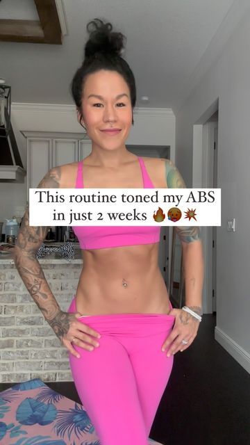 a woman in pink pants holding up a sign that says, this routine toned my abss in just 2 weeks