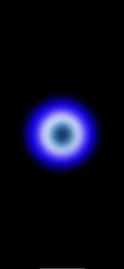 an image of a blue ring in the dark