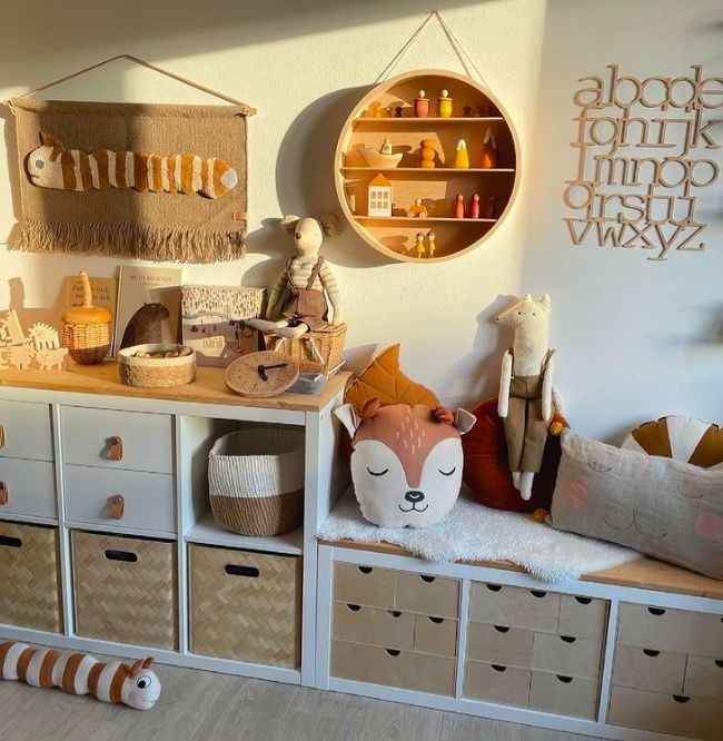 a room with many drawers and stuffed animals