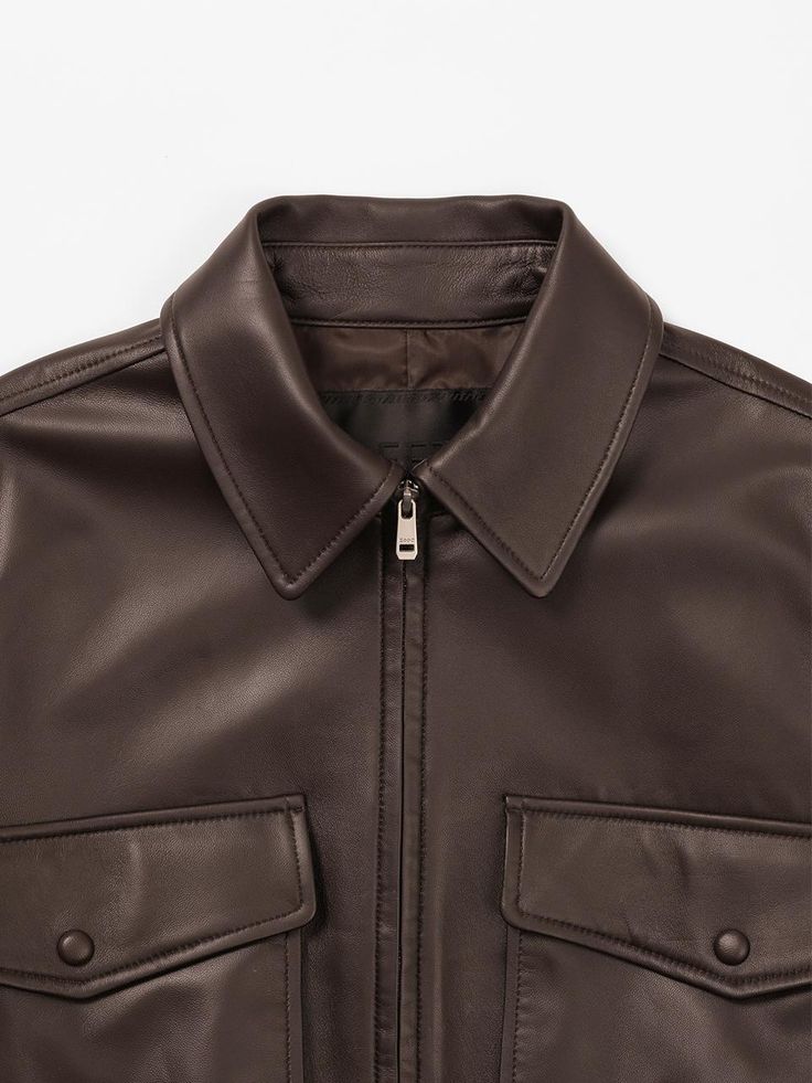 This product, the Real Leather Pocket Crop Jacket, is a statement piece that combines luxury with practicality. The genuine leather construction ensures durability and a high-quality feel, while the cropped silhouette and large pockets add both style and functionality. This jacket's versatile design makes it a perfect addition to a fashion-forward wardrobe. - The jacket is crafted from real leather, providing a rich texture and a premium look.- A cropped length gives this piece a contemporary edge and allows for easy pairing with high-waisted bottoms.- Large, practical pockets not only serve as a design feature but also enhance the jacket's utility.- Ribbed detailing on the hem and cuffs adds a classic touch to this modern leather garment. Luxury Leather Jacket With Flap Pockets, Luxury Leather Jacket With Pockets For Work, Luxury Leather Business Jacket With Pockets, Luxury Leather Jacket With Pockets For Business, Luxury Brown Leather Jacket With Pockets, Luxury Leather Outerwear With Pockets, Business Brown Leather Jacket With Flap Pockets, Brown Leather Jacket With Flap Pockets For Business, Fall Leather Jacket With Multiple Pockets