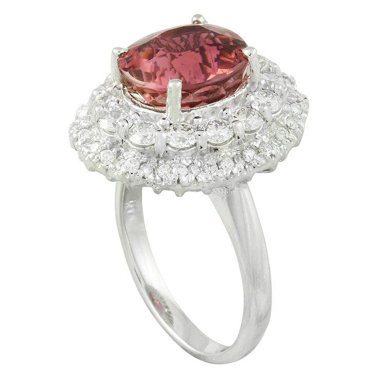 Stamped: 14K Total Ring Weight: 7.9 Grams Tourmaline Weight 5.30 Carat (11.00x9.80 Millimeters)Diamond Weight: 1.50 carat (F-G Color, VS2-SI1 Clarity )Face Measures: 20.40x17.90 Millimeter SKU: [601191] 14k White Gold Diamond Ring, Gold Diamond Ring, White Gold Diamond Rings, White Gold Diamonds, Precious Metals, Tourmaline, Gold Diamond, Diamond Ring, Vintage Jewelry