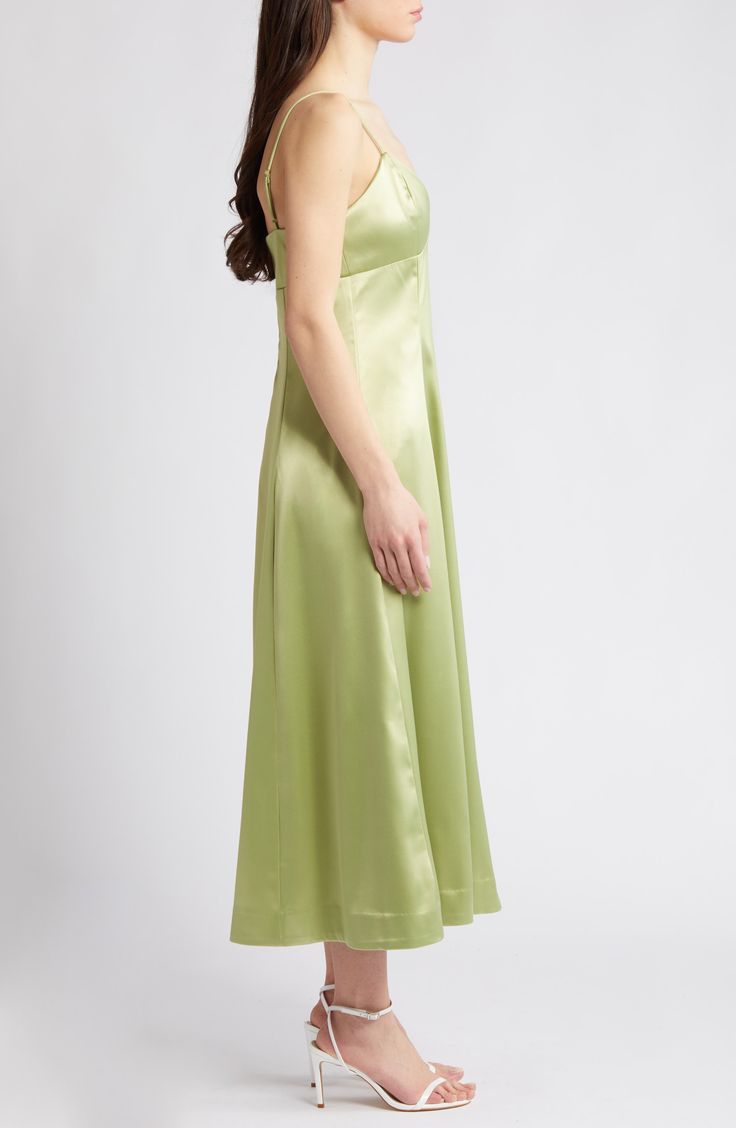 Glossy satin provides a graceful drape to this party-ready dress rendered in a fresh and verdant hue. 41" center front length (size Medium) Sweetheart neck Spaghetti straps 98% polyester, 2% elastane Dry clean Imported Green Silk Slip Dress For Evening, Green Silk Slip Dress For Formal Occasions, Green Satin Midi Dress For Evening, Green Satin Evening Dress With Fitted Bodice, Green Sleeveless Satin Dress For Formal Occasions, Green Satin Evening Dress For Summer, Green Satin Dress For Evening With Bias Cut, Green Satin Dress For Formal Occasions, Spring Satin Dress With Fitted Bodice