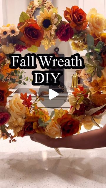 a wreath made out of fake flowers with the words fall wreath diy