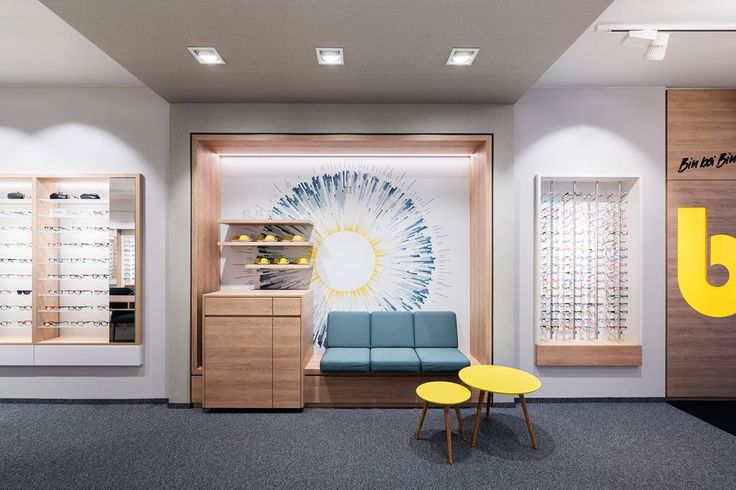 the inside of a store with eyeglasses on display