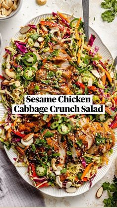 sesame chicken cabbage crunch salad on a white plate