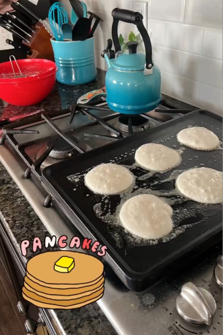 pancakes are being cooked on the stove top