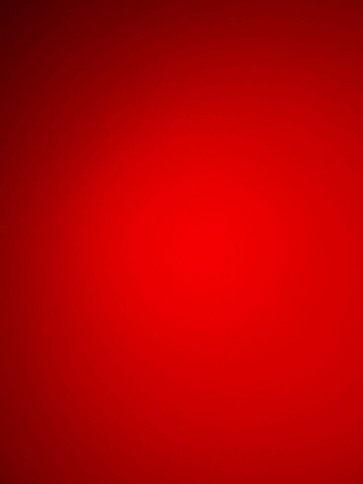 an abstract red background with light rays