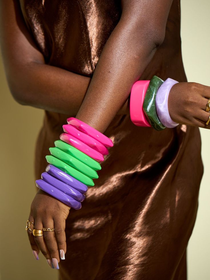 Introducing our vibrant and spirited collection of Colorful Bangles, a celebration of individuality and joyous self-expression. Crafted with meticulous attention to detail, these bangles are a kaleidoscope of hues, designed to complement any outfit and uplift your mood instantly. Each piece in this collection boasts a riot of colors, from bold and vibrant tones to subtle pastels, ensuring there's a bangle for every style and personality. Whether you prefer stacking them for a playful bohemian look or wearing a single statement piece, our Colorful Bangles effortlessly add a pop of color to your ensemble. Dive into a world of vivacity and flair – explore the endless possibilities our Colorful Bangles bring to your accessory collection. Bangles are sold as a set of three Product is non-return