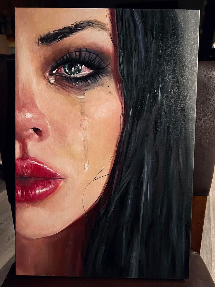 a painting of a woman with tears on her face