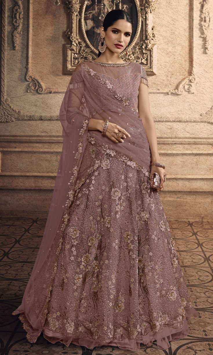 Mauve Designer Heavy Embroidered Net Wedding Lehenga-Saira's Boutique Dusty Pink Lehenga, Mauve Lehenga, Mauve Indian Outfit, Mauve Color Lehenga, Mauve Pink Lehenga, Pink Embroidered Net Lehenga, Shimmer Lehenga, Mauve Pakistani Bridal Dress, Simple Lehenga