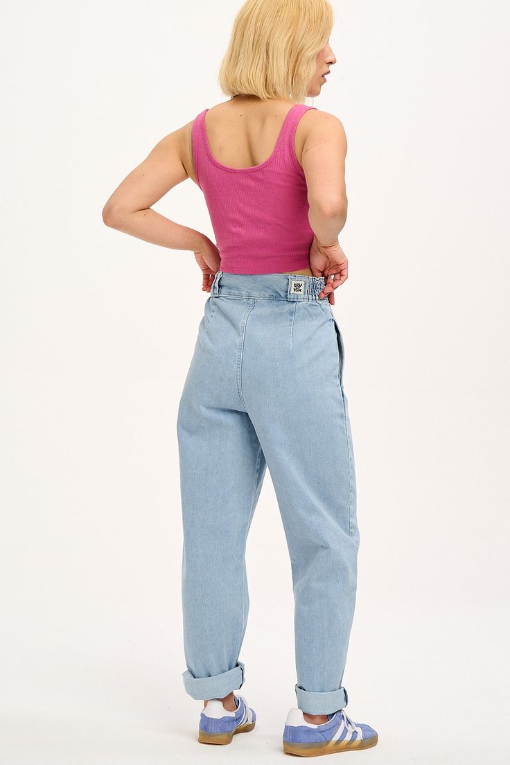 Addison Is Our High Waist Trousers With Elasticated Back And Tapered Leg. Referred To As “Magic Trousers” By Those With Big Hips And Withoutavailable Here In Light Wash Blue Denim! Our Fit High Waisted With A Wide Waistband To Sit Over The Waist, Extra Ease With Elasticated Side Panels Pleated Front To Allow Loose Fitting Over The Hips Tapered Full Length Leg With Room To Roll Deep Side Pockets The Fabric Made From 100% Gots Certified Organic Cotton Denim The Fabric Is Soft, Breathable And Durab Lucy And Yak, Dungarees Shorts, High Waisted Trousers, Jumpers And Cardigans, Hat Hairstyles, Playsuit Jumpsuit, Short Tops, Long Tops, Sweater Hoodie