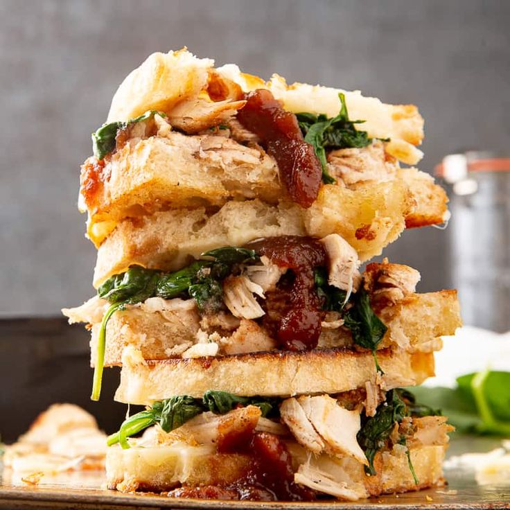 a stack of food sitting on top of a wooden table