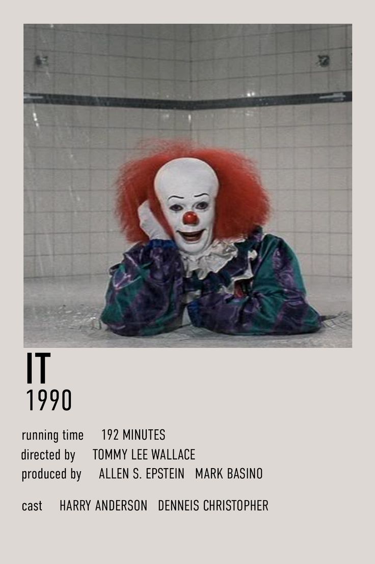 a creepy clown with red hair laying on the ground in front of a tiled wall