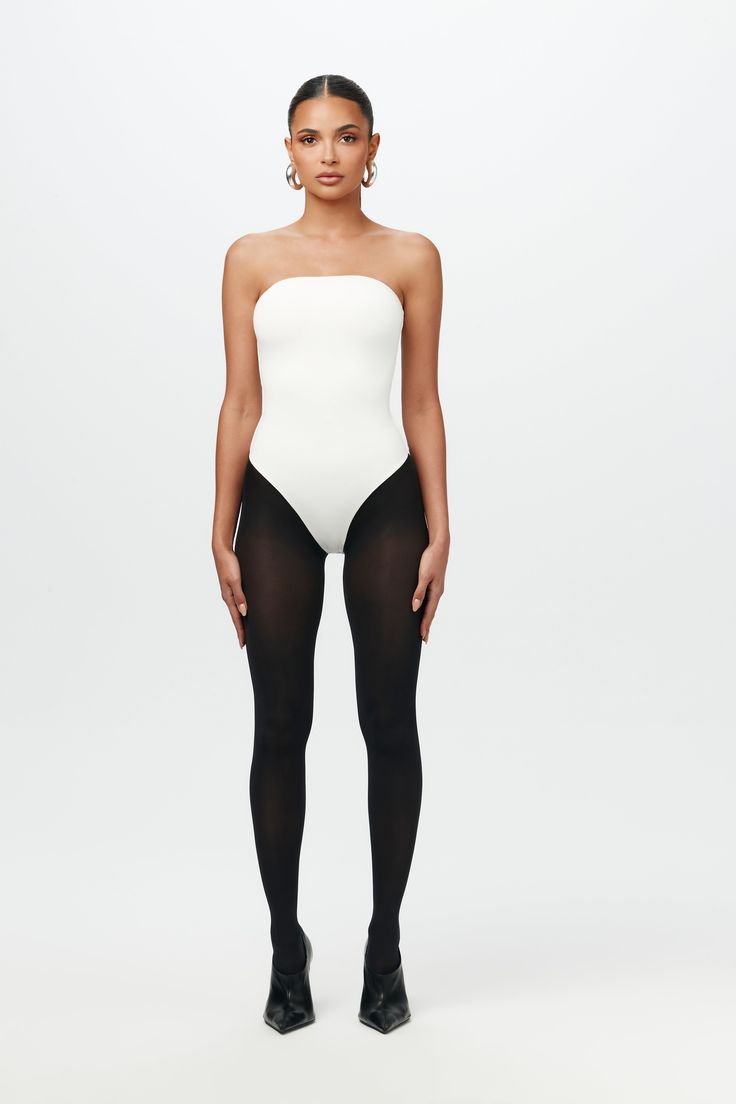 Far from basic. Our form-conscious bodysuit features a straight neckline and our signature double-lined fabric for a close, comfortable fit that won’t slip or chafe. Finished with a thong back and snap closure for seamless styling versatility. NW Collection Import 95% Viscose, 5% Spandex Model wears size X-Small True to size This bodysuit is double-lined All Bodysuits Are Final Sale Basic Bodysuit, Naked Wardrobe, Straight Neckline, Womens Bodysuit, Denim Pants, Snap Closure, Jumpsuit Dress, Your Style, Final Sale