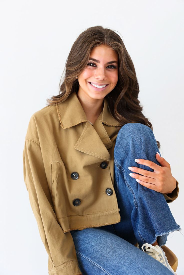 Unleash your inner fashionista with the Lizzy Double Breasted Tan Blazer! Make a statement with its cropped and relaxed fit, featuring long sleeves and a gorgeous tan color. Perfect for any occasion, this versatile blazer can elevate any everyday look. Whether you dress it up or down, this blazer is sure to make you stand out and feel confident! Runs true to size, cropped in length If worried about the length, we recommend sizing up Wash cold on gentle, hang to dry Color may vary due to lighting on image Flawless Cropped Beige Cotton Outerwear, Trendy Oversized Cropped Jacket For Fall, Cropped Cotton Jacket For Fall, Versatile Cotton Outerwear For Day Out, Cotton Cropped Jacket For Fall, Casual Long Sleeve Cropped Jacket For Day Out, Chic Cotton Cropped Jacket For Fall, Casual Cropped Jacket For Day Out, Versatile Long Sleeve Spring Blazer