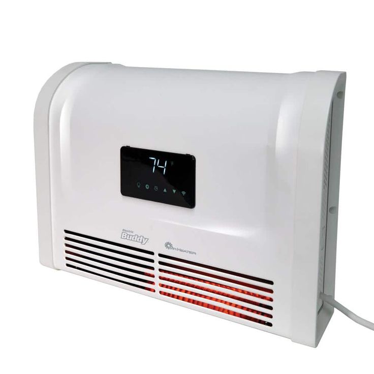 a white wall mounted heater with thermometer on it