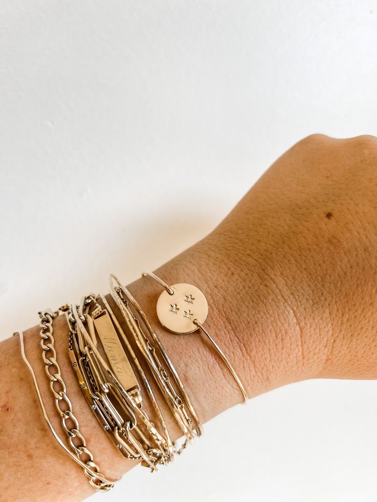 The Dani disc on a bangle! Keep it blank or stamp it with initials, symbols or something special just for you! The one of a kind bangle you’ve been looking for All components 14k gold filled leave your engraving notes below or at checkout bracelet fits most average wrists Gold Hand Stamped Bangle Bracelets, Gold Stackable Name Bracelet For Friendship, Stackable Gold Name Bracelet For Friendship, Gold Stamped Bangle Jewelry, Adjustable Hand Stamped Gold Bracelets, Hand Stamped Bangle Jewelry, Adjustable Gold Bangle With Stamped Details, Hand Stamped Gold Bangle Bracelets, Gold Stamped Bracelet For Everyday