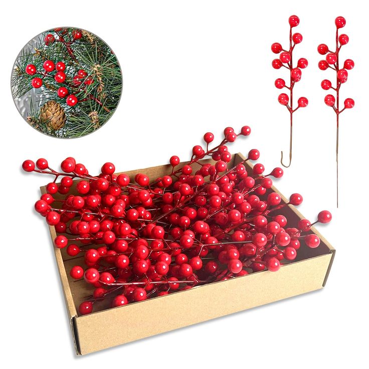 a box filled with red berries on top of a table