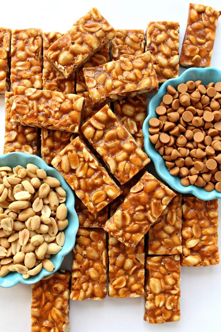 peanut butter fudges and peanuts in blue bowls