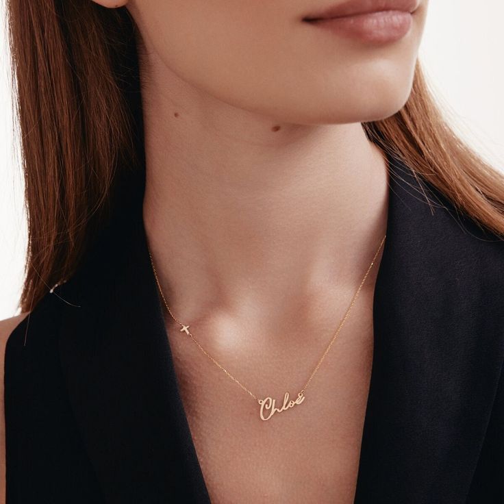 "1- P R O D U C T ∙  D E S C R I P T I O N This 14K Solid Gold Custom Name Necklace with Sideways Cross is a unique piece of jewelry, perfect for expressing personal faith and style. Ideal for women, it offers a chic, minimalist design that complements any outfit. A personalized gift that's both meaningful and stylish, it's made of 14K real gold, promising lasting shine and durability. 2- P R O D U C T ∙ D E T A I L S Gold material: 14K solid gold Choice of gold color: Yellow gold, Rose gold, White gold Choice of chain length: 14\", 16\", 18\", 20\" Dimensions: *Pendant Height: 10.32 mm / 0.40 in *Pendant Width: 21.90 mm / 0.86 in 3- S H I P P I N G ∙ A N D ∙ R E T U R N S We know you're excited to get your hands on your order, and we're just as excited to get it in your hands. We take pri Luxury White Gold Name Necklace, Elegant White Gold Name Necklace With Polished Finish, Luxury Gold Name Necklace, Formal Fine Jewelry Name Necklace In White Gold, Formal White Gold Name Necklace In Fine Jewelry Style, Dainty Diamond Name Necklace, Dainty 14k Stamped Name Necklace, Elegant Yellow Gold Initial Pendant Necklace, Luxury 14k Gold Name Necklace For Formal Occasions