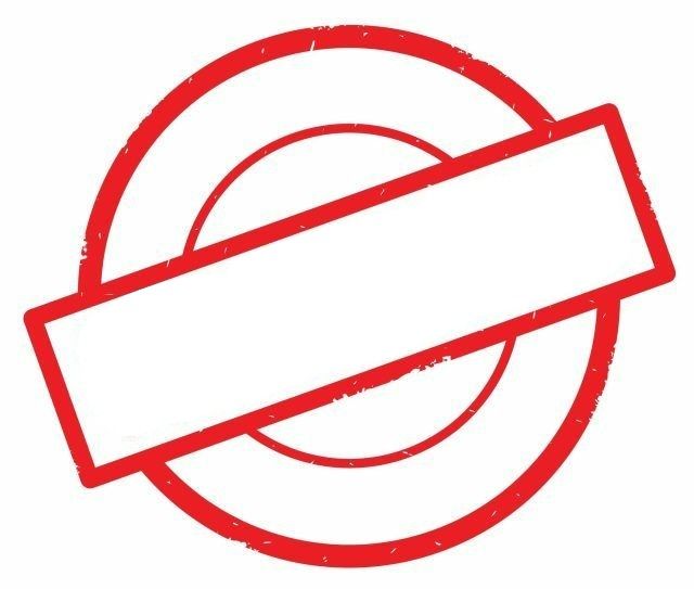 a red rubber stamp with a white sign in the middle and a circle around it