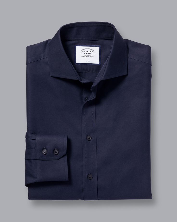 100% cotton, Available in slim and extra slim fit, Non-iron, Modern spread collar, Split yoke for optimal fit and comfort, Slim fit: back pleats for ease of movement, Extra slim fit: streamline back darts, Mitred two-button cuff or square French cuff, Complimentary brass collar stays, Machine washable - Cutaway Collar Non-Iron Twill Shirt - Navy Slim Fit Cotton Business Shirt, Cotton Slim Fit Business Shirt, Fitted Spread Collar Top For Business, Fitted Business Tops With Spread Collar, Fitted Top With Spread Collar For Business, Slim Fit Cotton Shirt With Spread Collar, Business Cotton Tops With Spread Collar, Slim Fit Cotton Dress Shirt For Work, Classic Slim Fit Business Tops