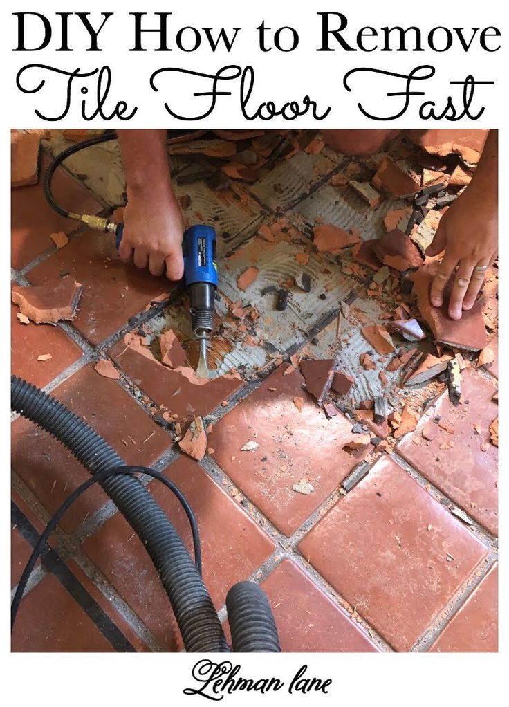 a person using a vacuum to remove tile from the floor with text overlay that reads diy how to remove the floor fast