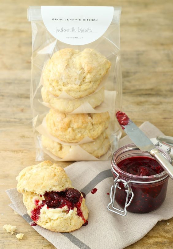 biscuits and jam are sitting on a table