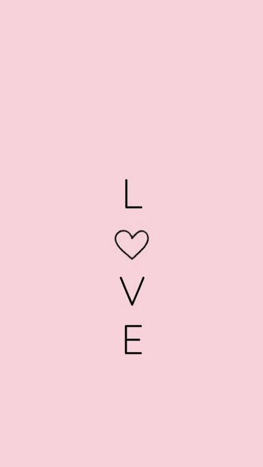 the word love is written in black on a pink background with a small heart above it