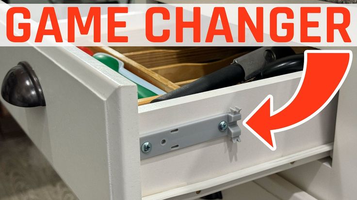 an open drawer with the words game changer in red and white overlaying it