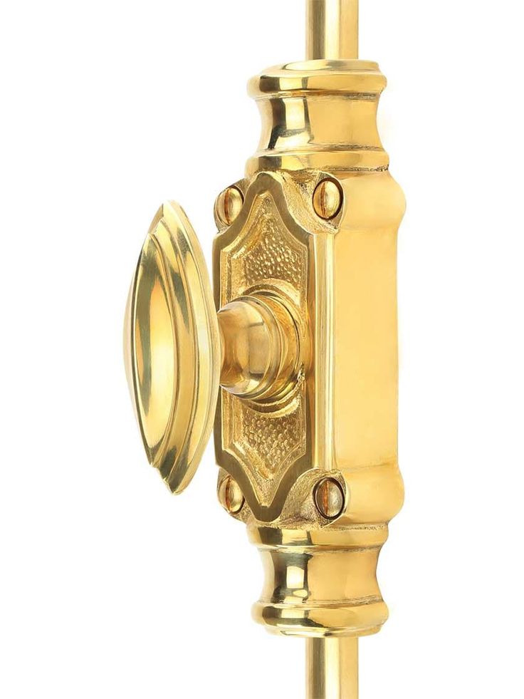 a golden door handle with a knob on the front and side of it, against a white background