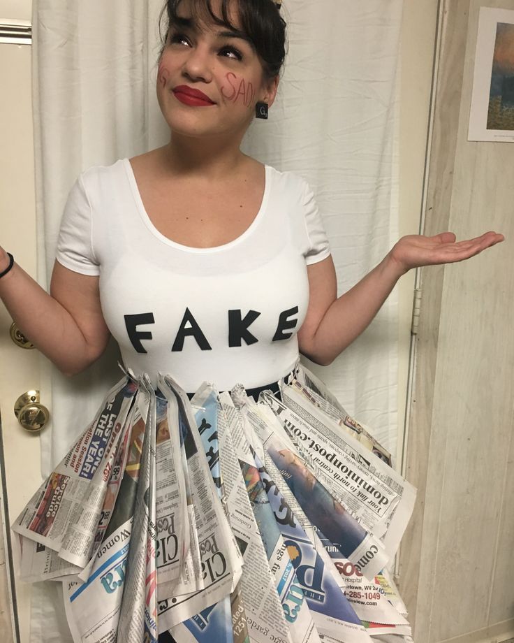 a woman with fake newspaper around her body