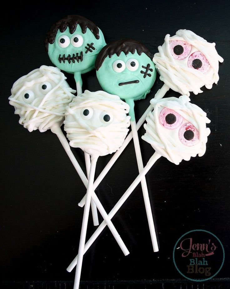 there are some cake pops with faces on them